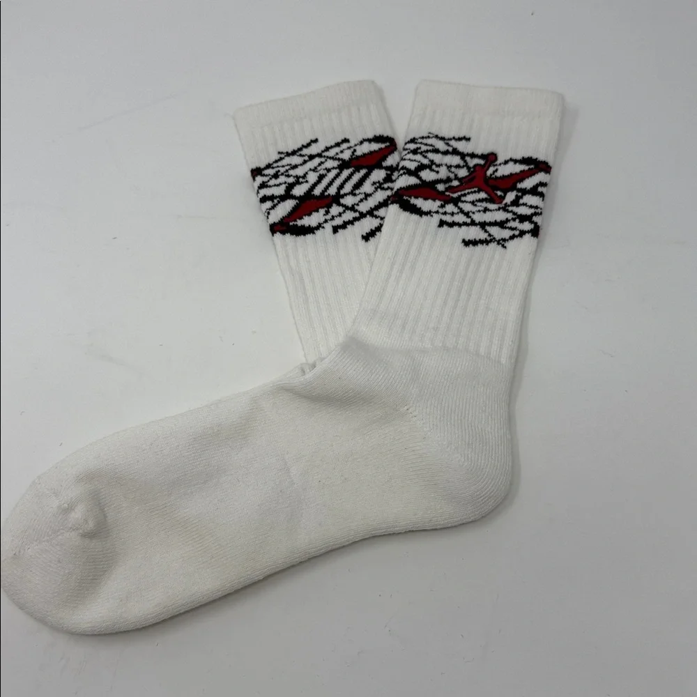White Jumpman Jordan Socks with Red and Black Pattern NEW-No tags 7”sole
